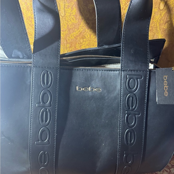 Bebe bag nwt
offer - Picture 10 of 13